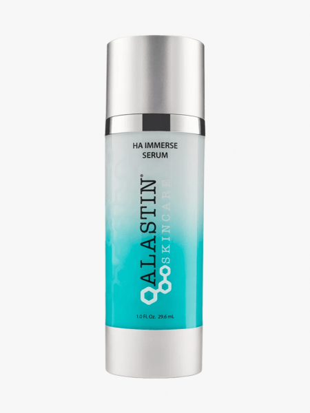 Alastin HA Immerse Serum in metallic silver bottle on light gray background
